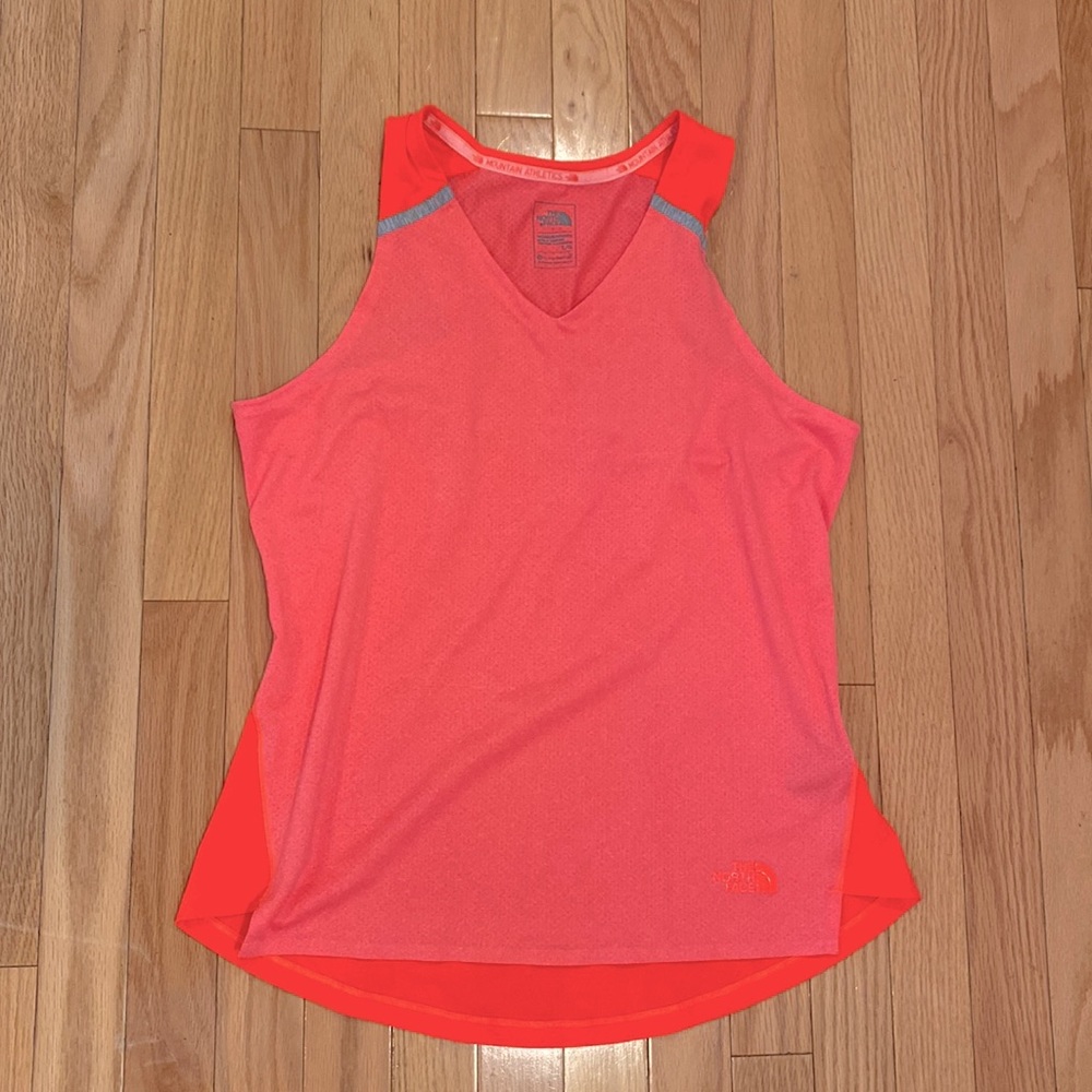 The North Face bright coral-pink athletic tank top. Like new.